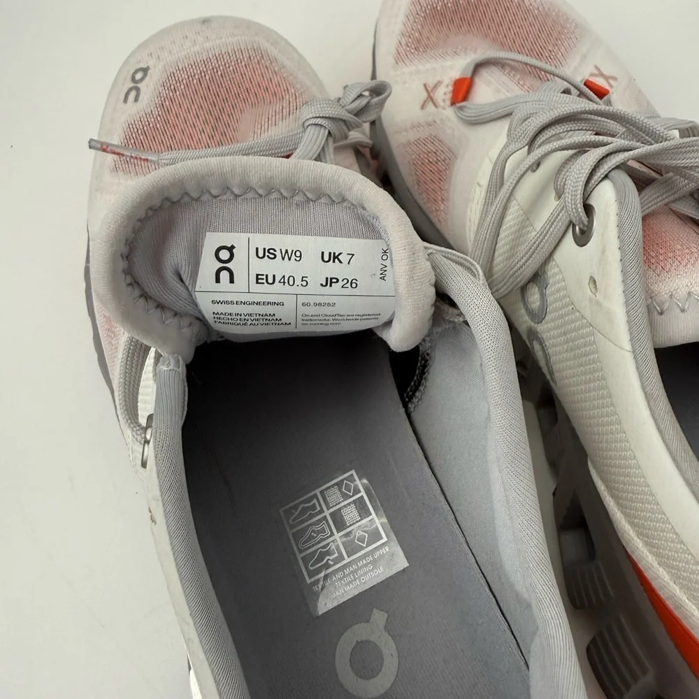 On Running Women's Athletic Shoes - White and Orange. Like new. size 9